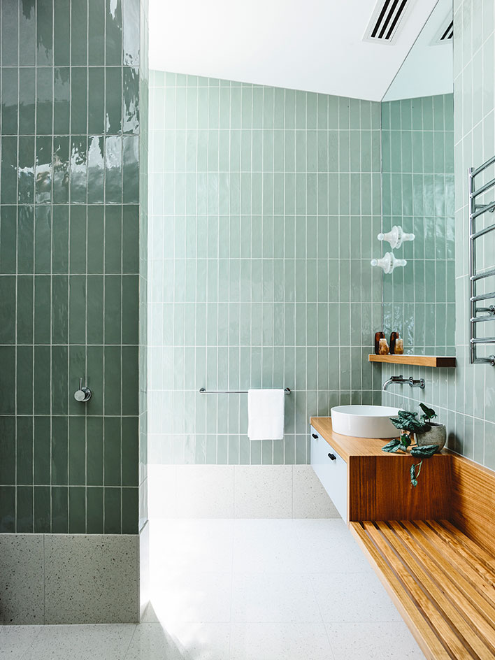 Light green and warm woods is a great and natural-looking option for a bathroom