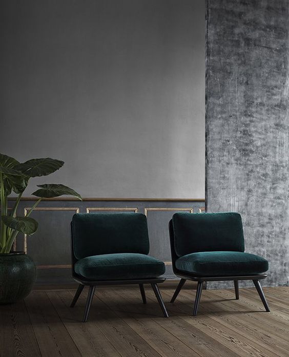 emerald velvet upholstery makes a statement here