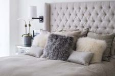 07 taupe-colored upholstered bed with taupe pillows looks very inviting yet neutral