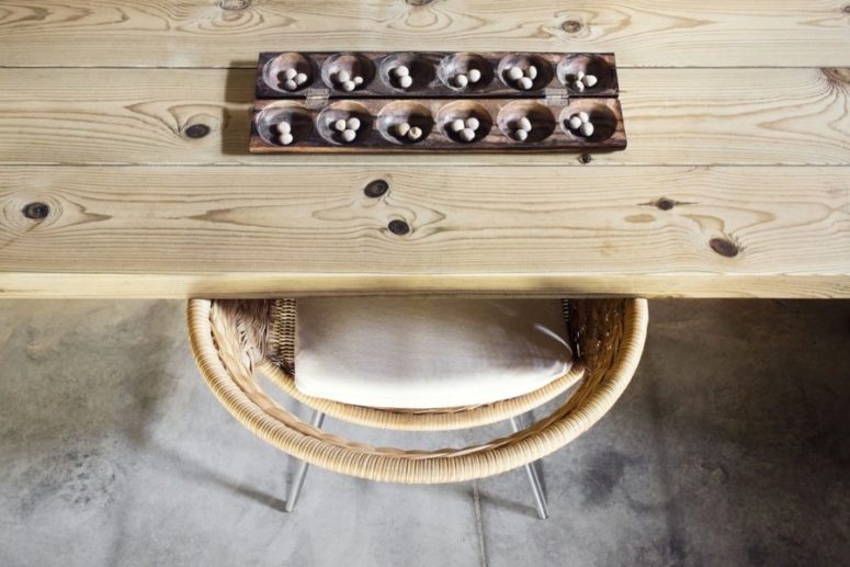 Concrete floors are great with rock, and warm light colored woods add coziness and comfort to the home Concrete floors are great with rock, and warm light-colored woods add coziness and comfort to the home