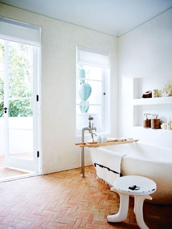 The bathtub is also an antique one, and lots of warm earthy tones around add coziness to every space The bathtub is also an antique one, and lots of warm earthy tones around add coziness to every space