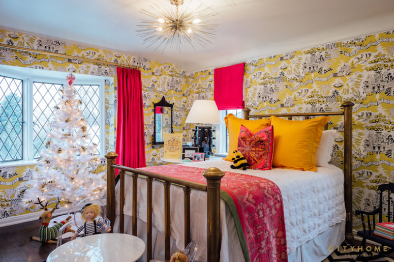 The kids' room is done in super bold colors like yellow and fuchsia