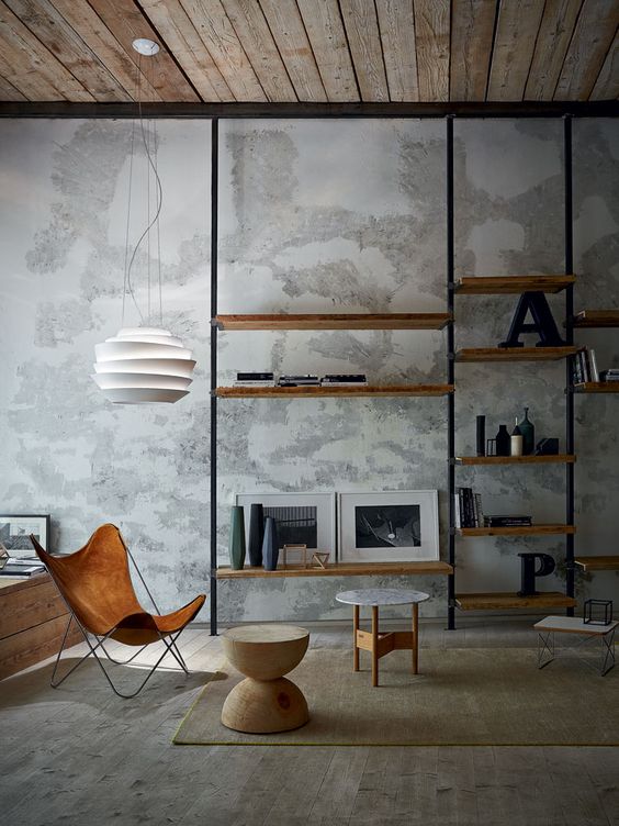 modern living room with a whitewashed concrete wall