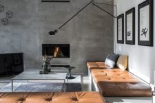 11 chic masculine living room with a concrete wall and copper leather