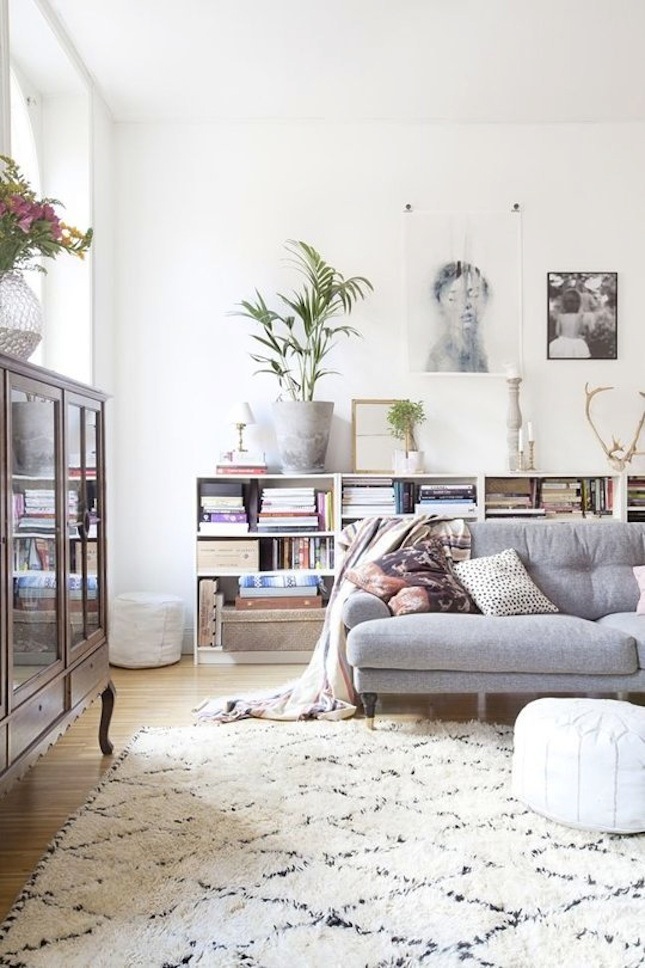 light-colored patterned fluffy rug helps to make this space very inviting