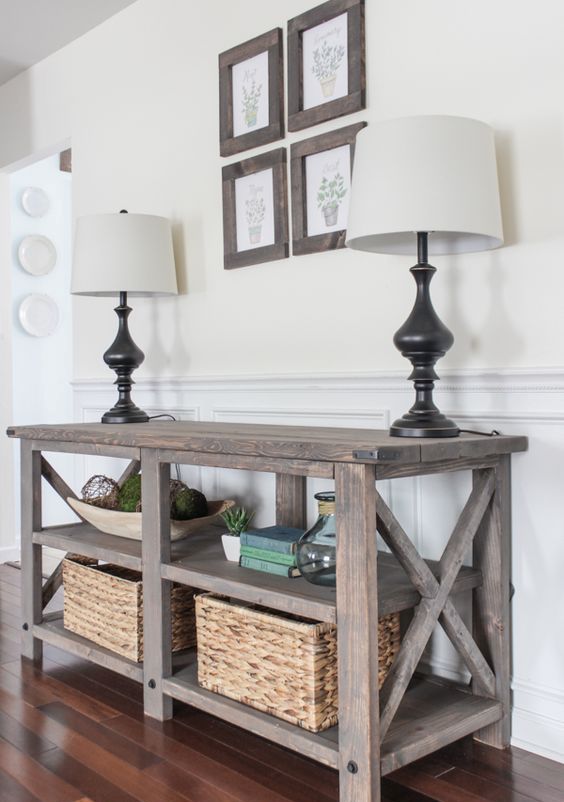 wooden console table with a couple of shelves stained in brown