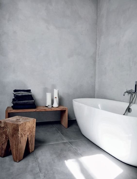 concrete walls and a grey tile floor look perfect together and are a functional idea for a bathroom