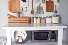 16 kitchen island with a white pegboard for storage