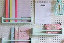 18 white pegboard with mint-colored shelves is great for a girlish space