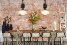 19 industrial kitchen decor with a rough concrete floor and brick walls