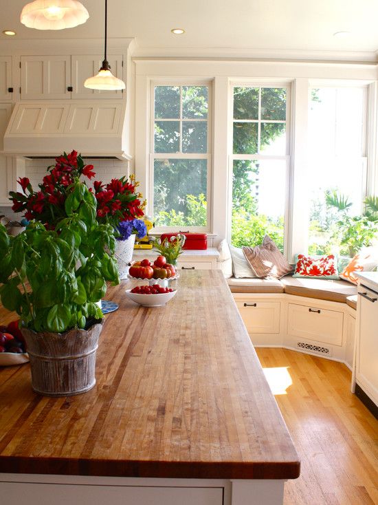 long island in the kitchen with a wood counter