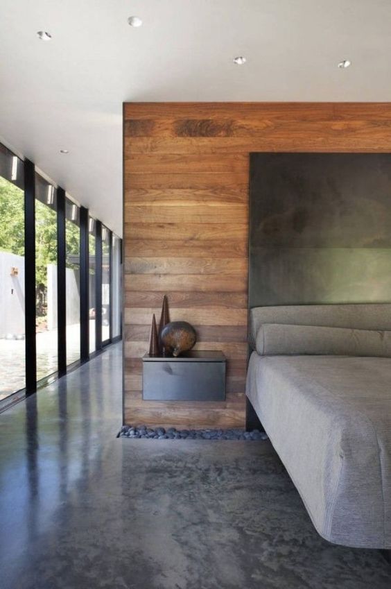 polished grey concrete for a comfortable and modern bedroom look
