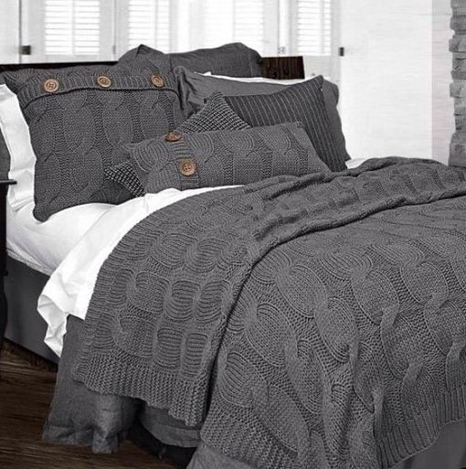 grey cable knit pillow covers and a blanket