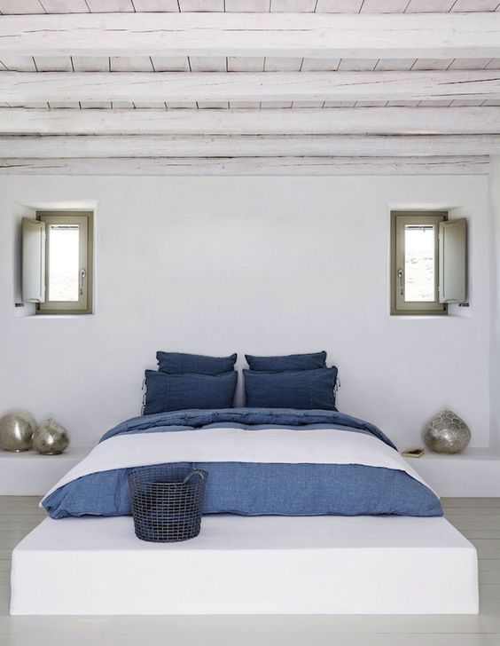 denim-style bedding with additions of wwhite for a seaside home