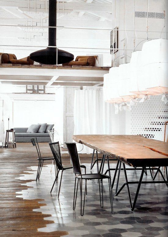 hexagonal tiles in the dining zone and wood around it