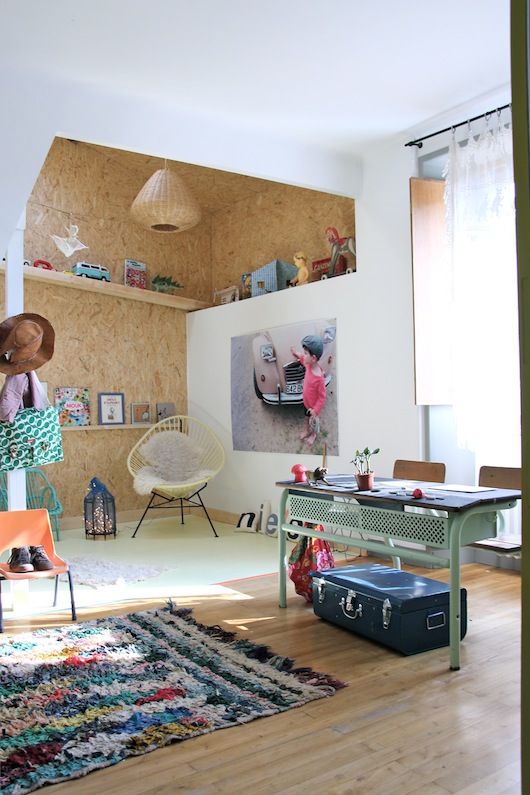 play space is accentuated with cork tiles on the walls and ceiling