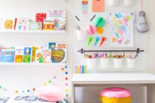 23 a pegboard in a kids’ room is a great idea because all kids love drawing and crafting