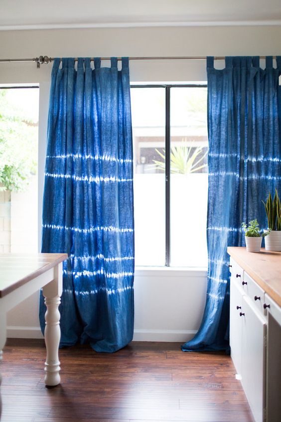 indigo shibori-dyed curtains can make a bold statement in any room