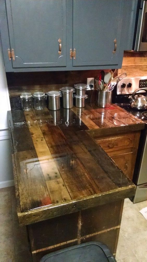 dark stained and polished pallet wood kitchen counter