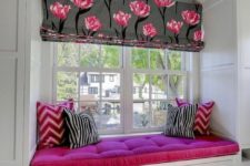 25 window sill nook with fuchsia upholstery in a girl’s bedroom