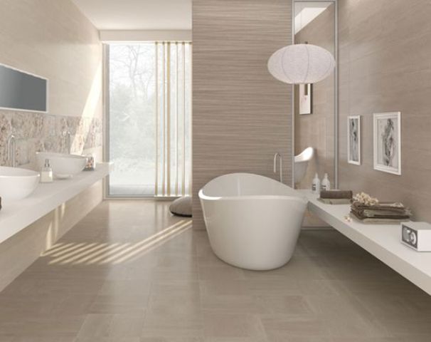 modern taupe bathroom with walls and floor in that color, filled with light