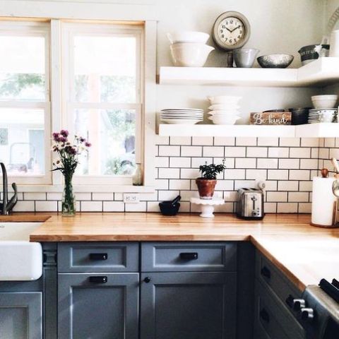 open shelving, butcher block countertops and painted cabinets