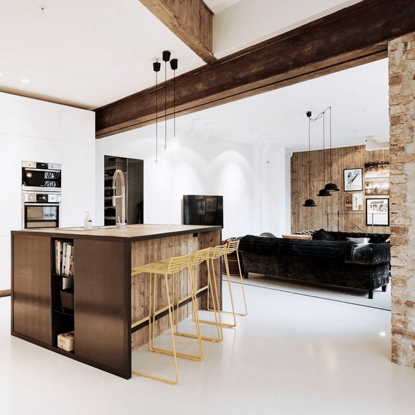 various levels of the ceiling with wooden beams and lights