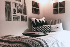 29 rather a neutral room with boho blankets, black and white pictures