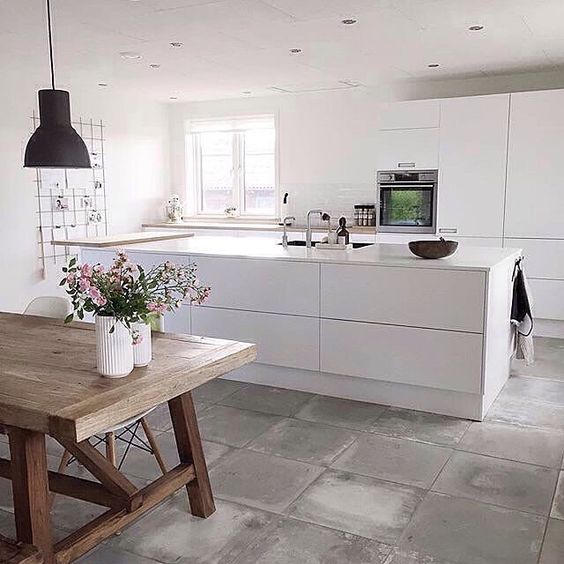 concrete tiles are a durable and cool option for any modern kitchen