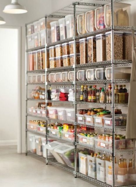 plastic air-tight containers and wire baskets on metal shelving units