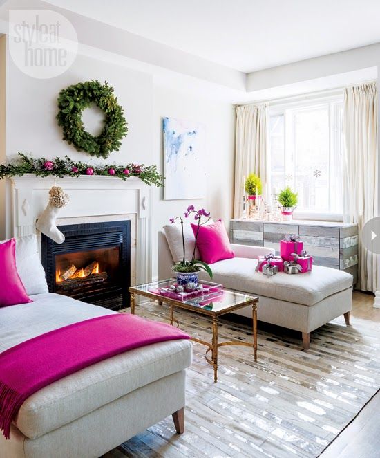 a couple of fuchsia throws and blankets can change the look of the whole room