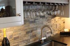31 faux stone kitchen backsplash adds texture to the decor