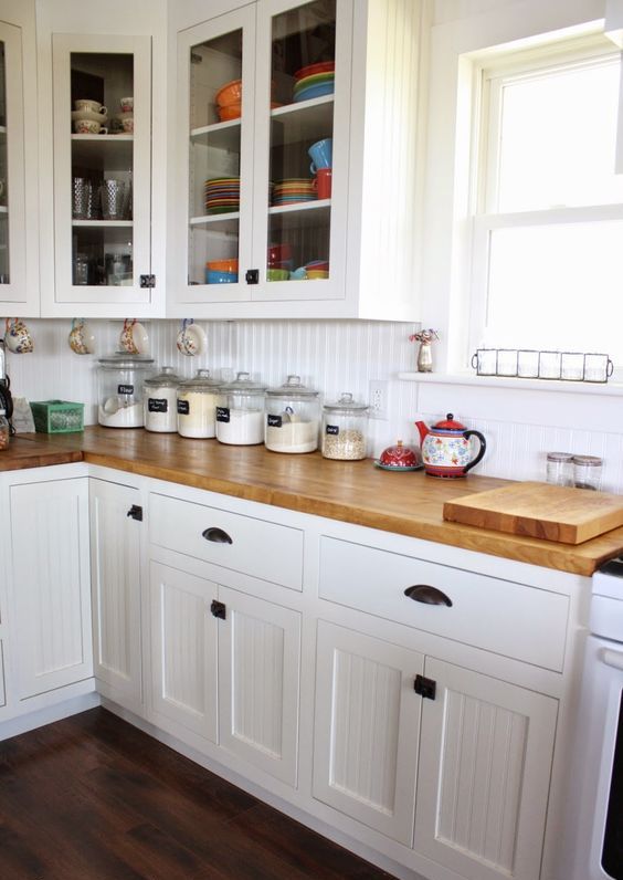 modern farmhouse kitchen with light-colored wooden countertops