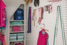 33 pegboard wall in a closet for all caps, bags and jewelry