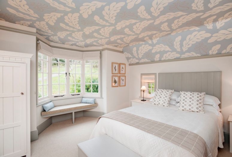 Botanical prints on a ceiling is a really creative way to make a taupe bedroom looks interesting. (Woodford Architecture and Interiors)