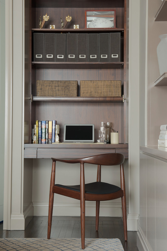 A small yet well organized closet office features a practical bult-in floating desk. A classic wooden chair is a great addition to a neutral color scheme. (Certified Luxury Builders - San Francisco Area)