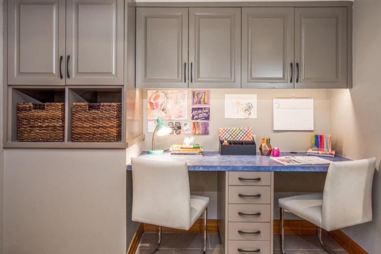 Taupe cabinets can hold lots of things in a well organized home office. (CG&amp;S Design-Build)