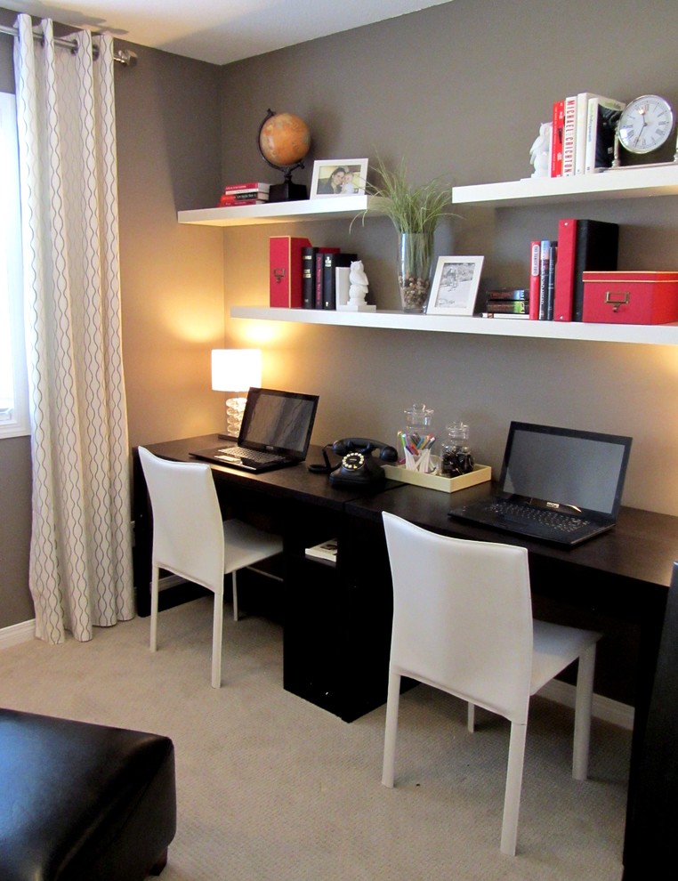 This simple home office features taupe walls and popular IKEA Lack floating shelves on them. (Concept to Design Inc.)