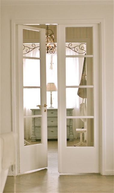 white doors with glass