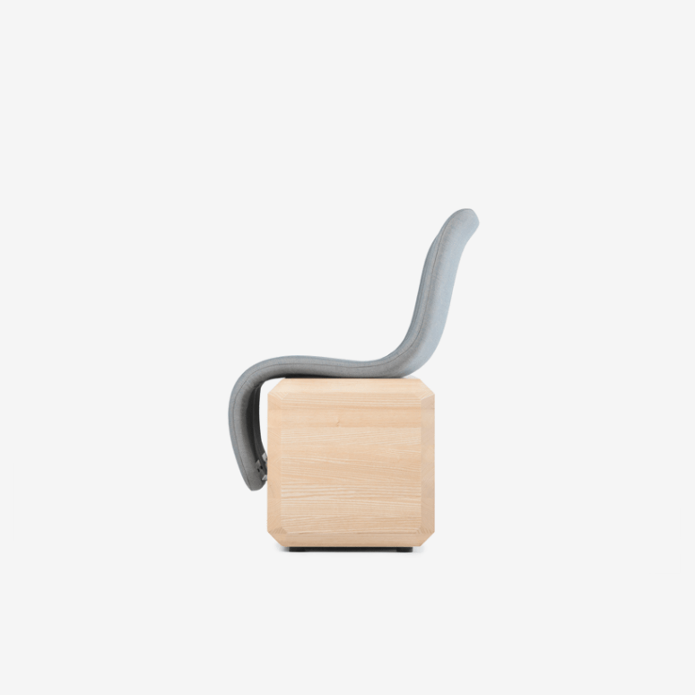The design includes a sharp contrast between the organic profile of the seat and the geometric sturdy base The design includes a sharp contrast between the organic profile of the seat and the geometric sturdy base