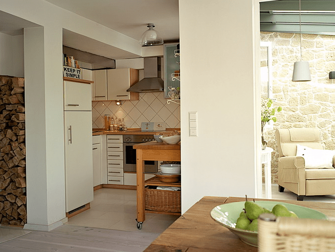 The kitchen is a small nook decorated in the same creamy shades and though it's small, there's everything necessary The kitchen is a small nook decorated in the same creamy shades and though it's small, there's everything necessary