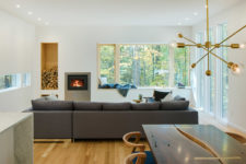 living room with a stylish firewood storage in a wall