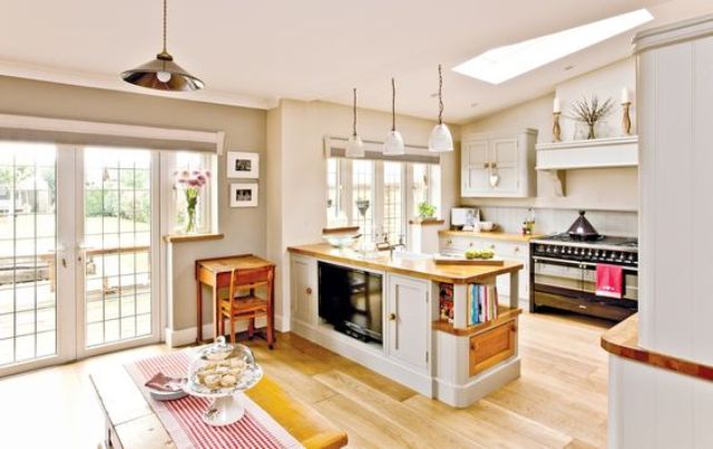 country-style kitchen and a dining space with a striped table runner