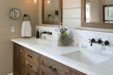 04 dark stained farmhouse bathroom cabinetry with a white counter