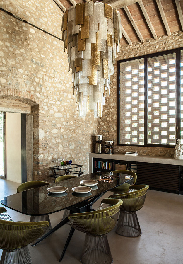 Wooden beams, stone clad remind of the historical past of the dining space and modern art deco furniture shows the tastes of the owners Wooden beams, stone clad remind of the historical past of the dining space and modern art deco furniture shows the tastes of the owners