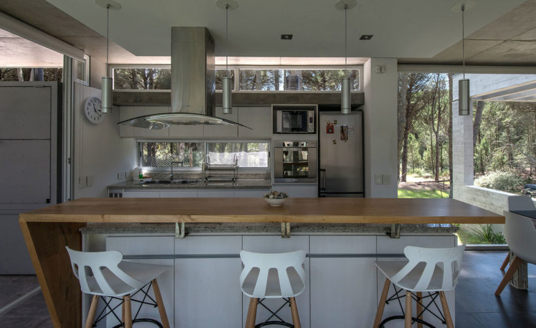 I love how contrasting are the looks of inside and outside, industrial spaces and a natural forest landscape I love how contrasting are the looks of inside and outside, industrial spaces and a natural forest landscape