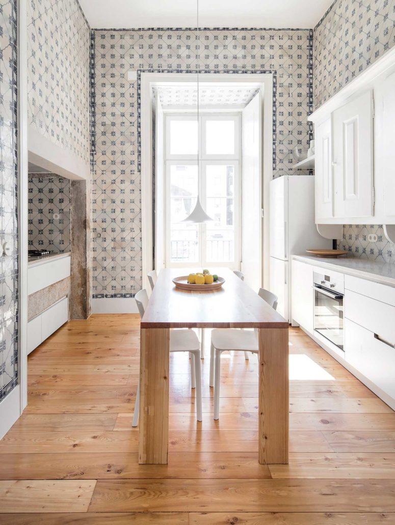 In the kitchen the desginers left the unique 19th century azulejo tiles and installed all the rest in modern style for a contrast In the kitchen the desginers left the unique 19th century azulejo tiles and installed all the rest in modern style for a contrast