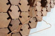06 unique wooden honeycomb tiles that are functional and can be used for hanging and holding