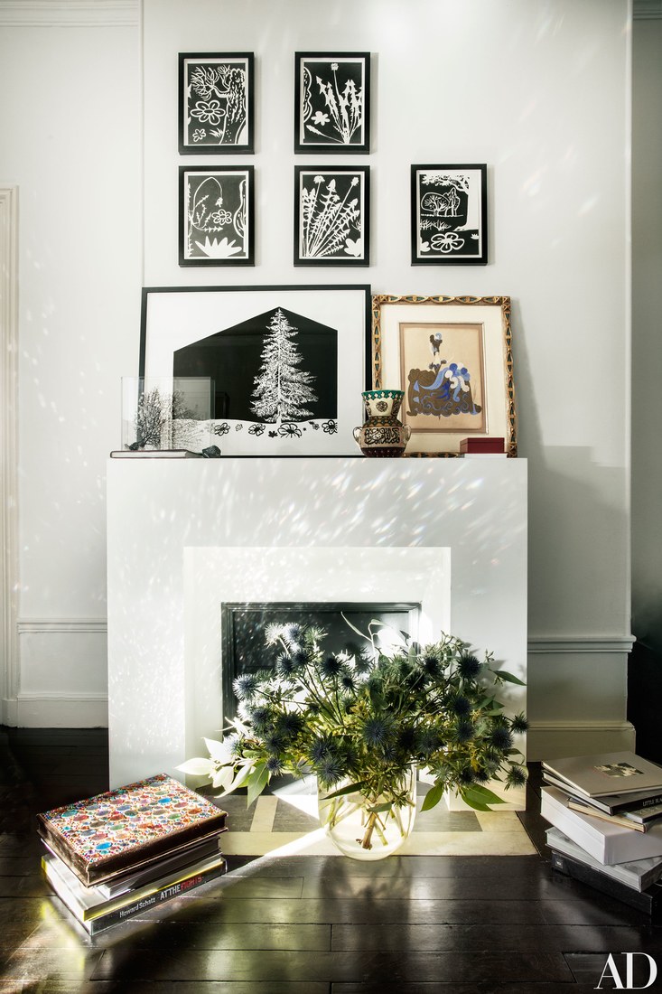 artwork display idea The fireplace as used for displaying the artworks mostly and I love thistles instead of flowers