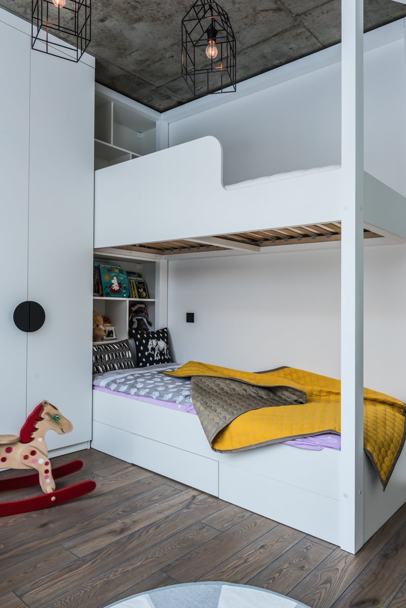 There's a bunk bed and all the storage is again sleek and hidden, which helsp to declutter the space